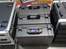 +VAT 3 Duratool hard cases together with a black and silver flight case