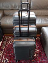 +VAT 3 piece Superdry suitcase set in black and orange (no box)