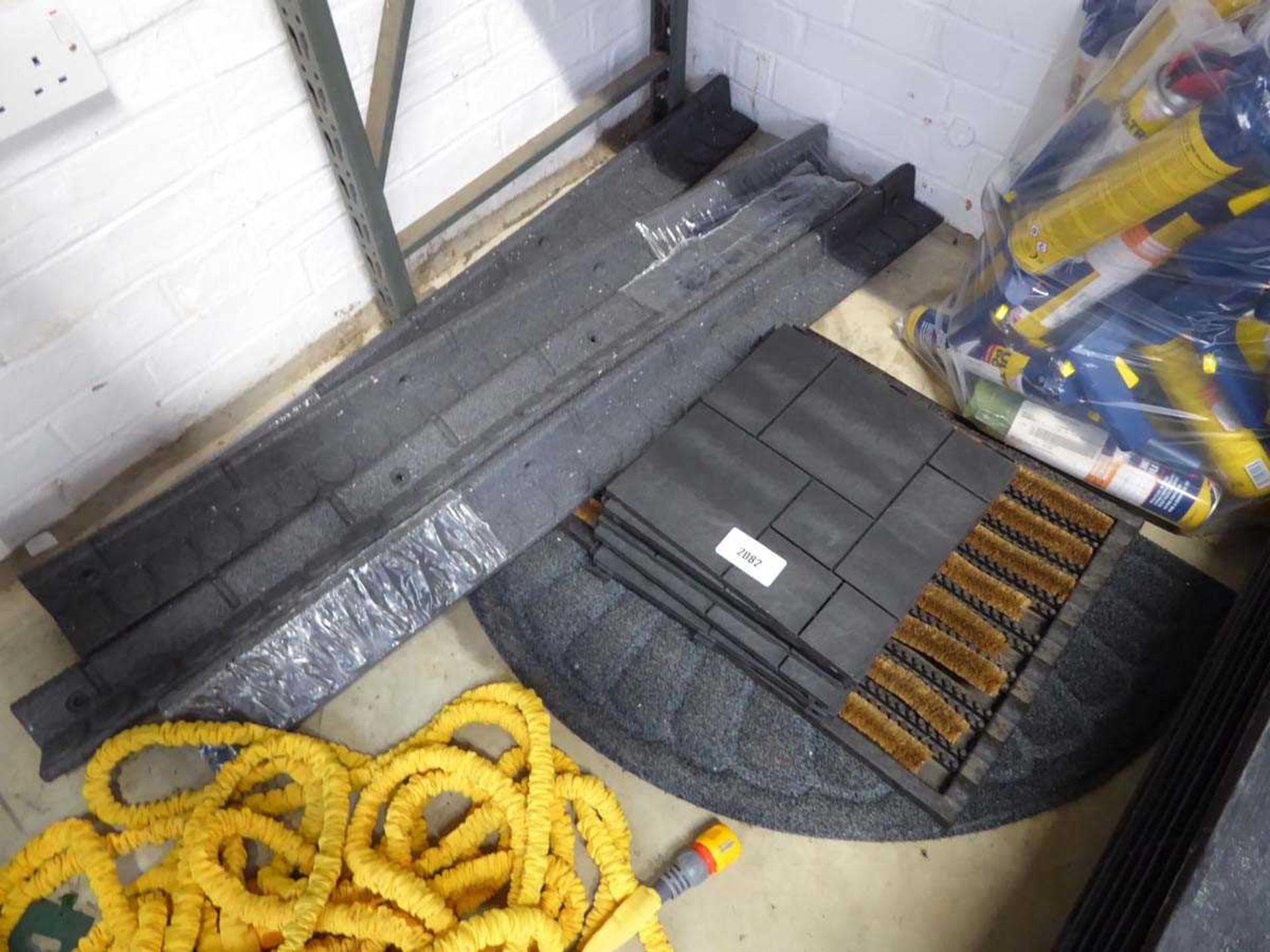 +VAT Quantity of various size door mats with quantity of black composite click together deck tiles