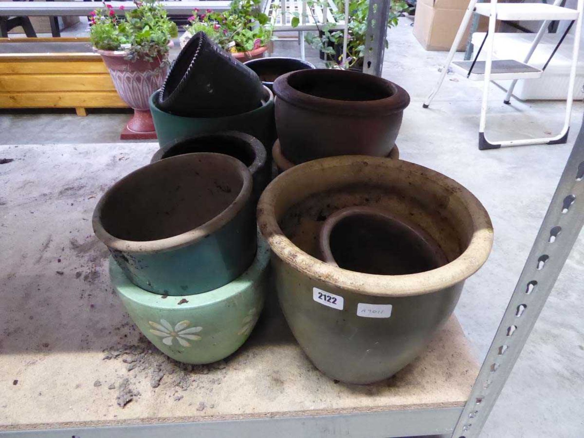 Quantity of various style garden pots