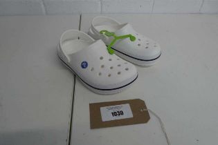 +VAT Pair of Crocs in white size UK 4