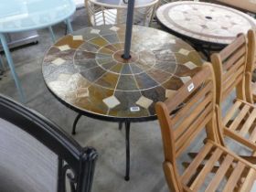 Circular tile top garden table