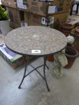 Circular mosaic tile top garden table