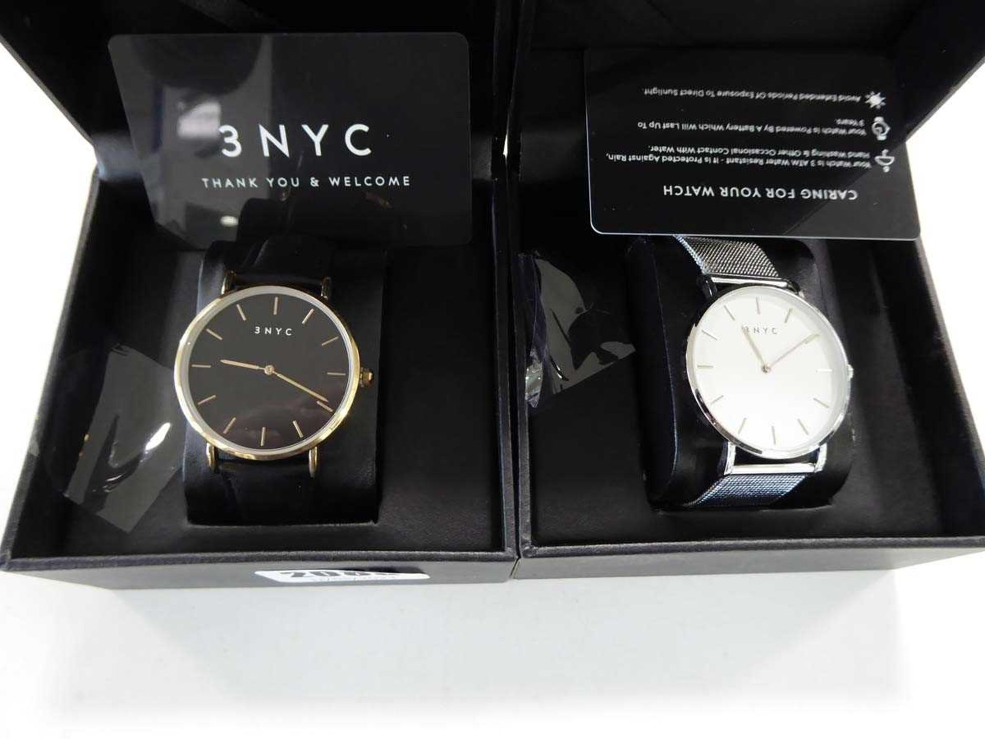 2x 3 NYC watches, 1 with gold strap and black face and 1 with silver strap and white face - Image 2 of 2