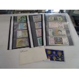 (3) 3 folders of bank notes and various coins
