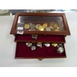Presentation case containing various pocket watches