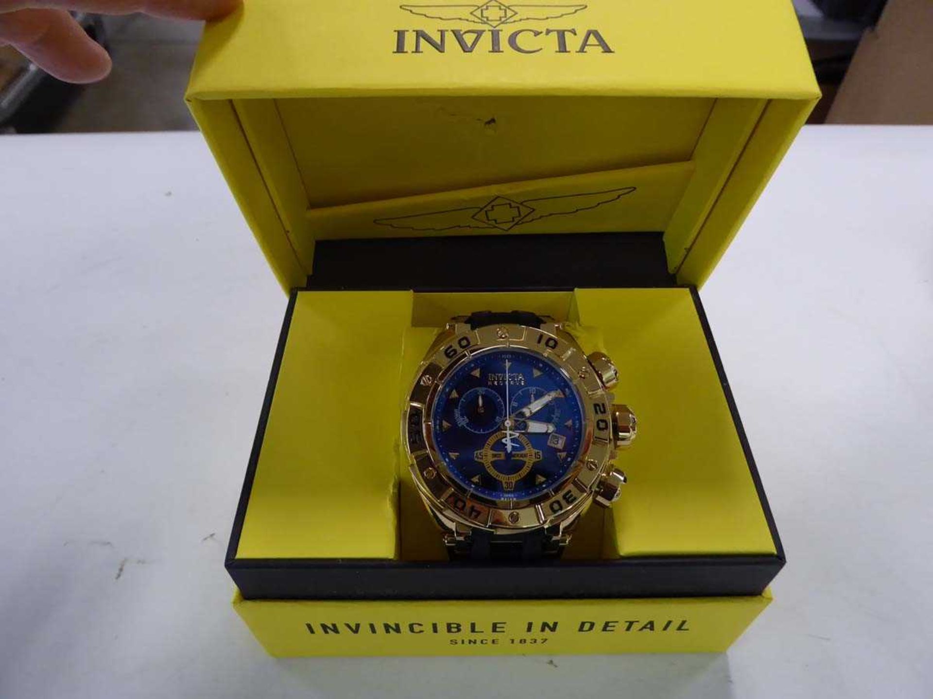 +VAT Invicta Reserve sub-dial Swiss movement watch with blue face and black strap, boxed