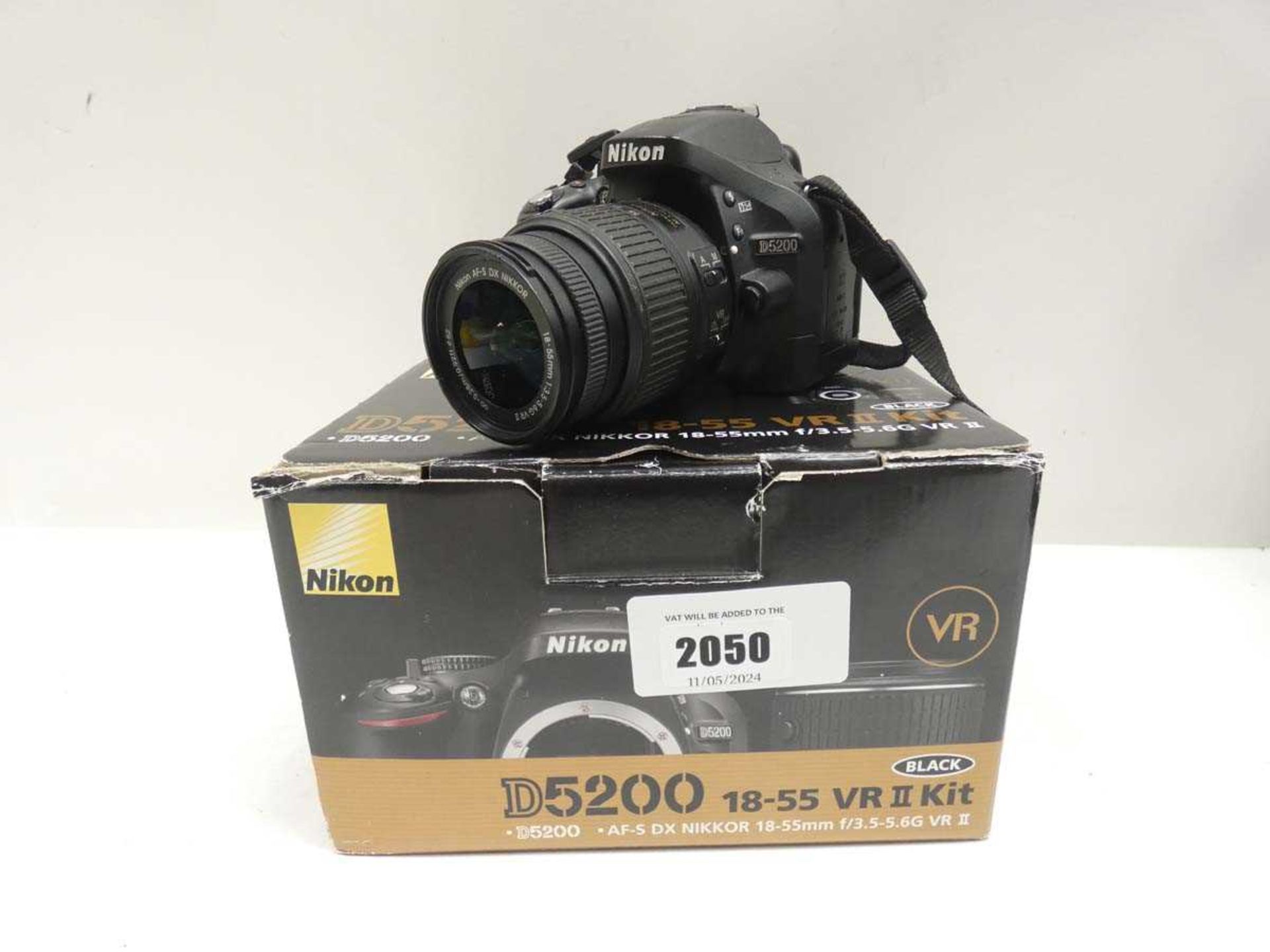 +VAT Nikon D5200 DSLR camera with 18-55mm VR II lens, box and charger