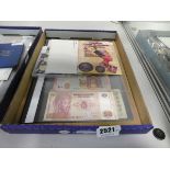 (9) Folder of bank notes and various coins