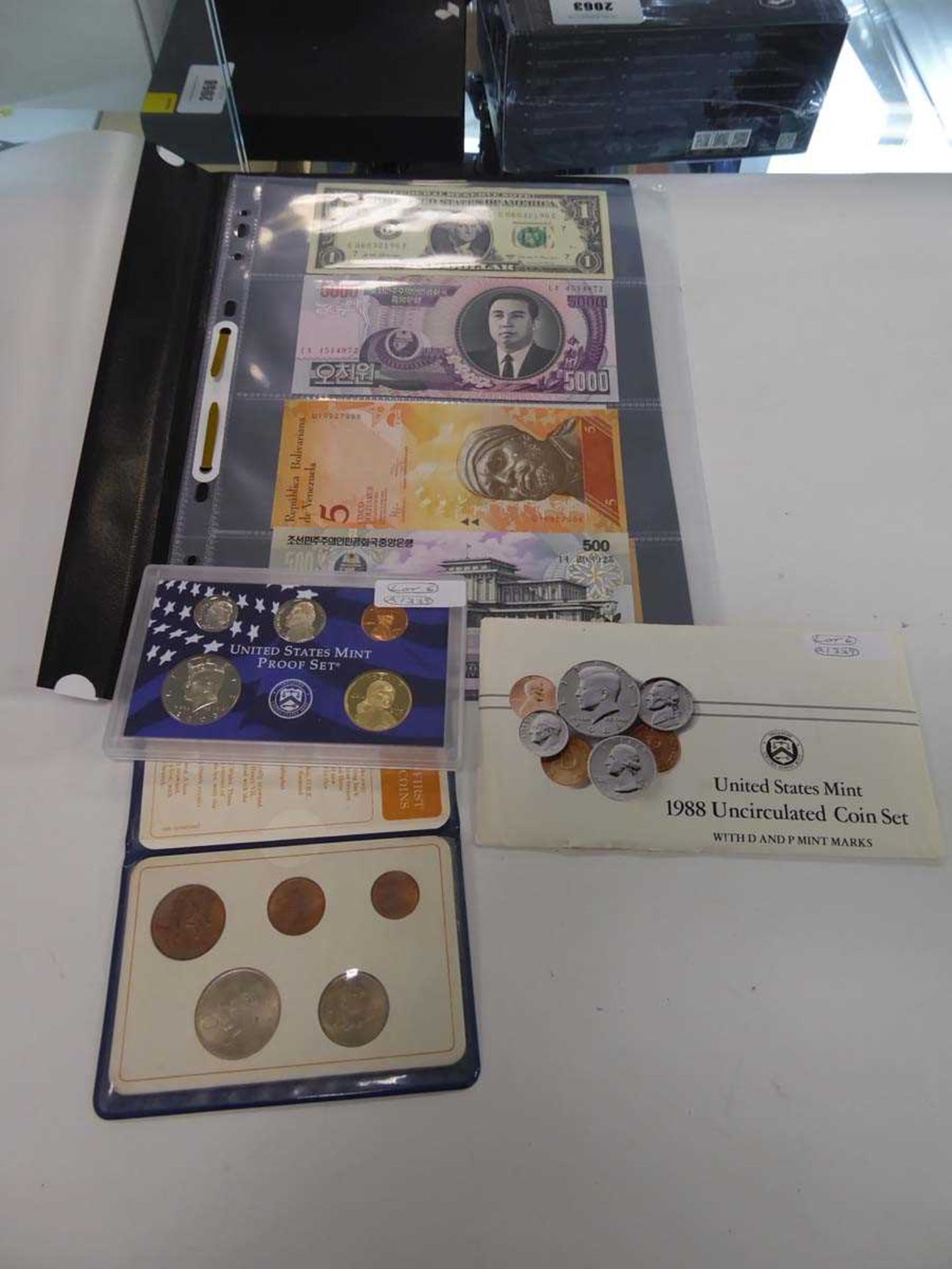 (6) Folder of bank notes and various coins