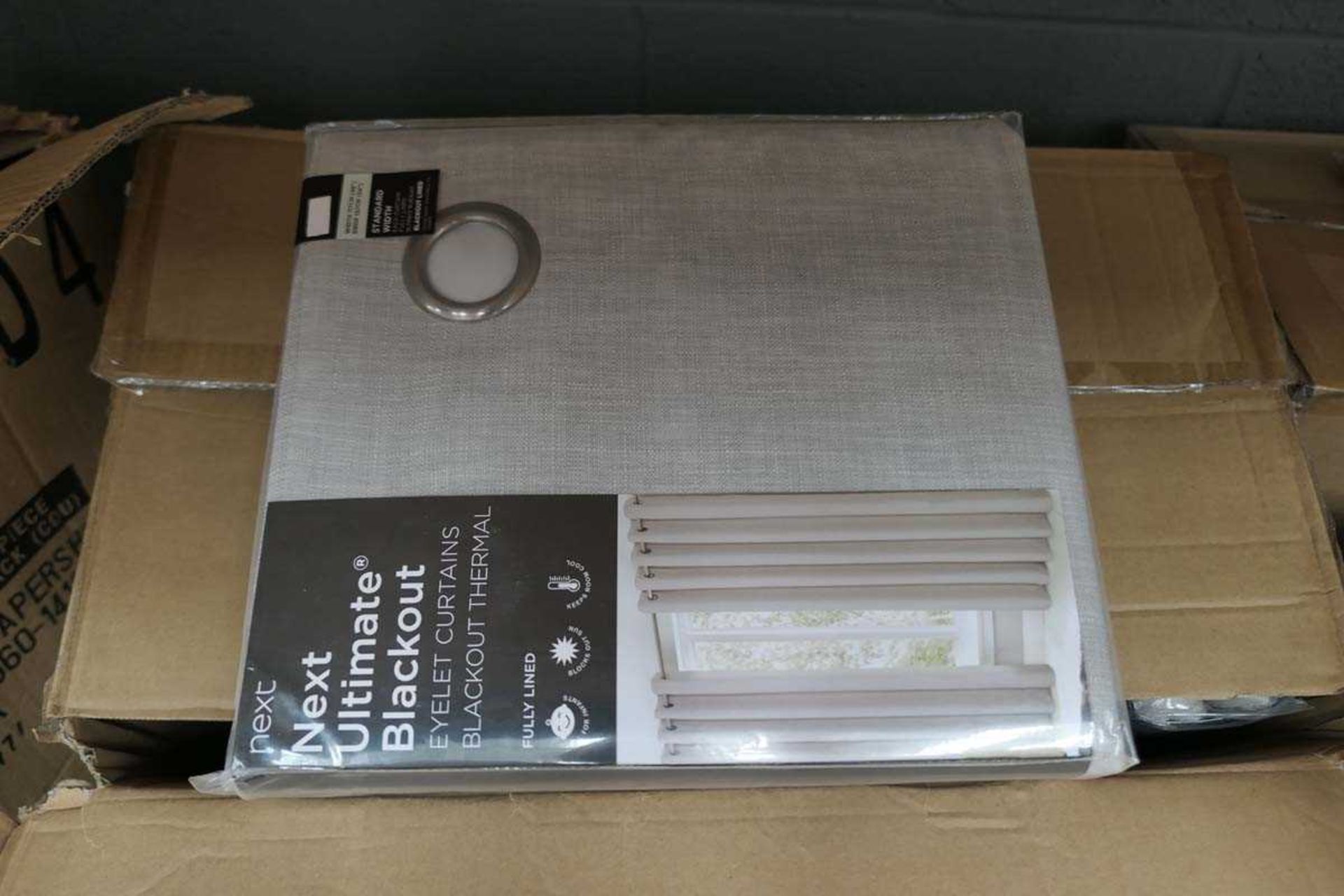 Box containing Next ultimate blackout thermal curtains