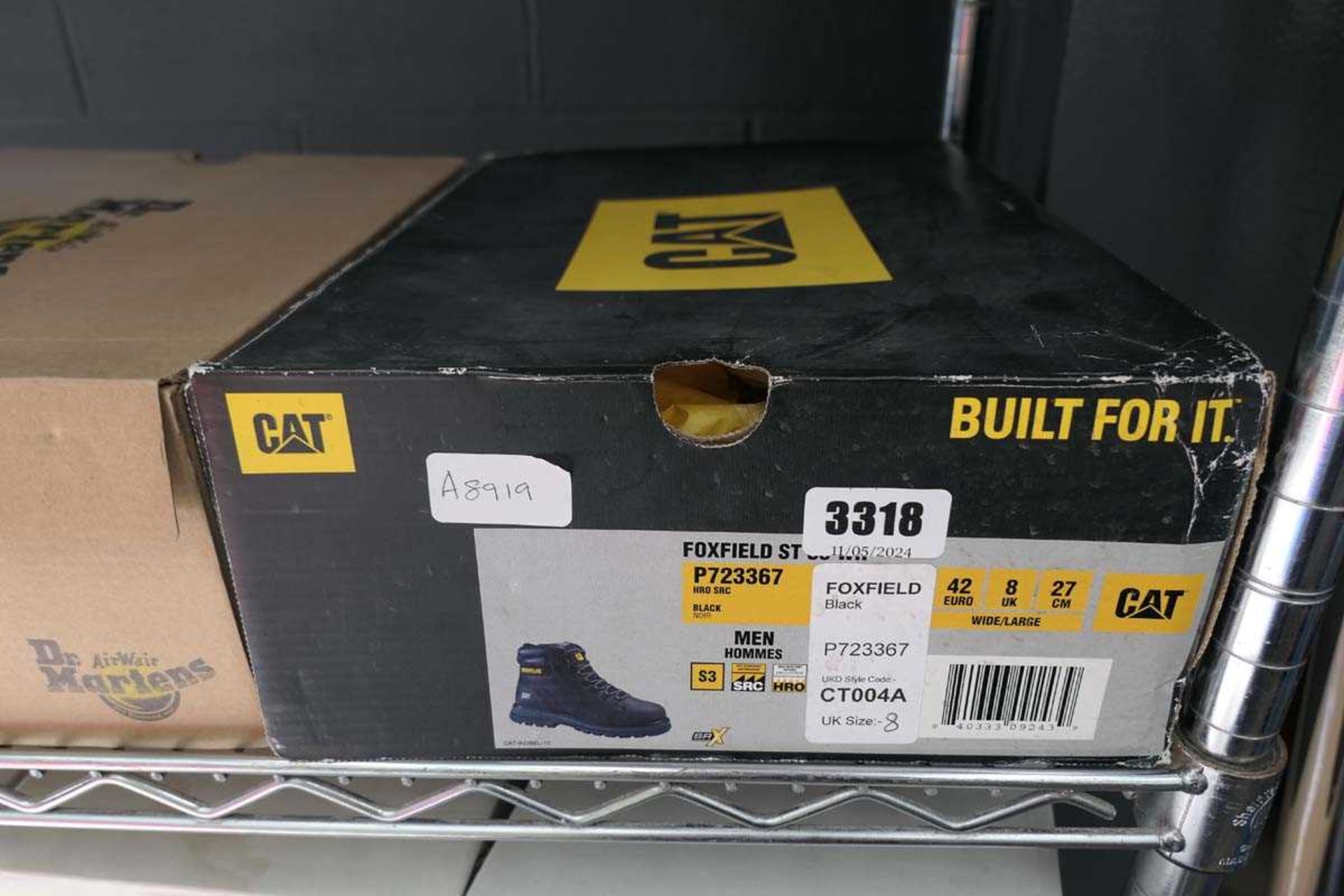 Boxed pair of CAT safety boots