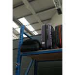 +VAT Purple medium hard shelled suitcase plus a black ruffle bag