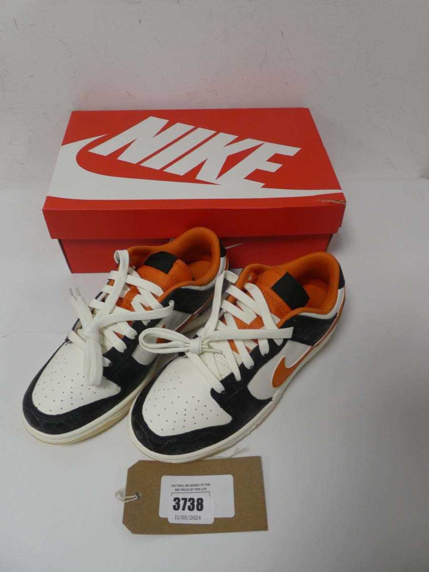 +VAT Boxed pair of Nike Dunk Low Retro trainers, white, orange and black, UK 6