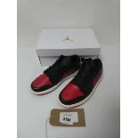 +VAT Boxed pair of ladies Nike Air Jordan 1 low trainers, black and red, UK 5