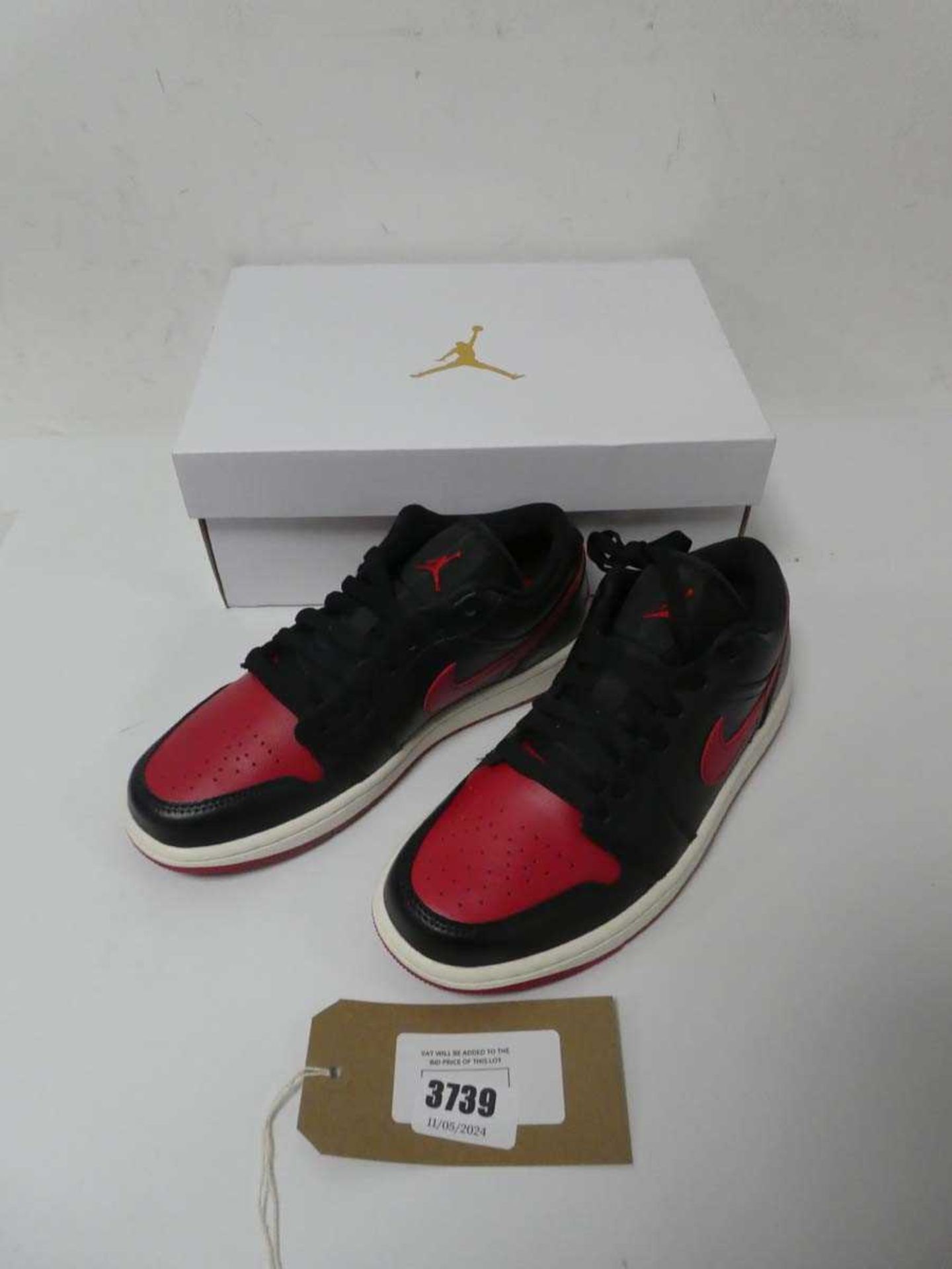 +VAT Boxed pair of ladies Nike Air Jordan 1 low trainers, black and red, UK 5