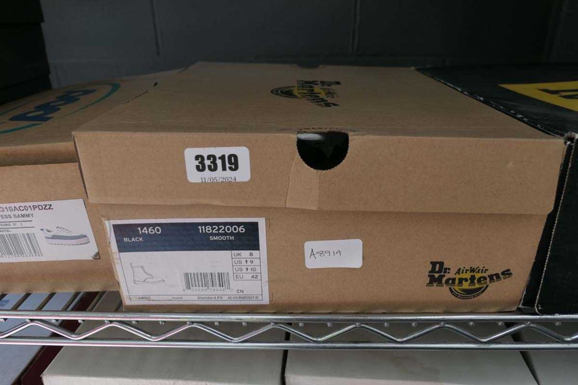 Boxed pair of Dr Martens boots size 8