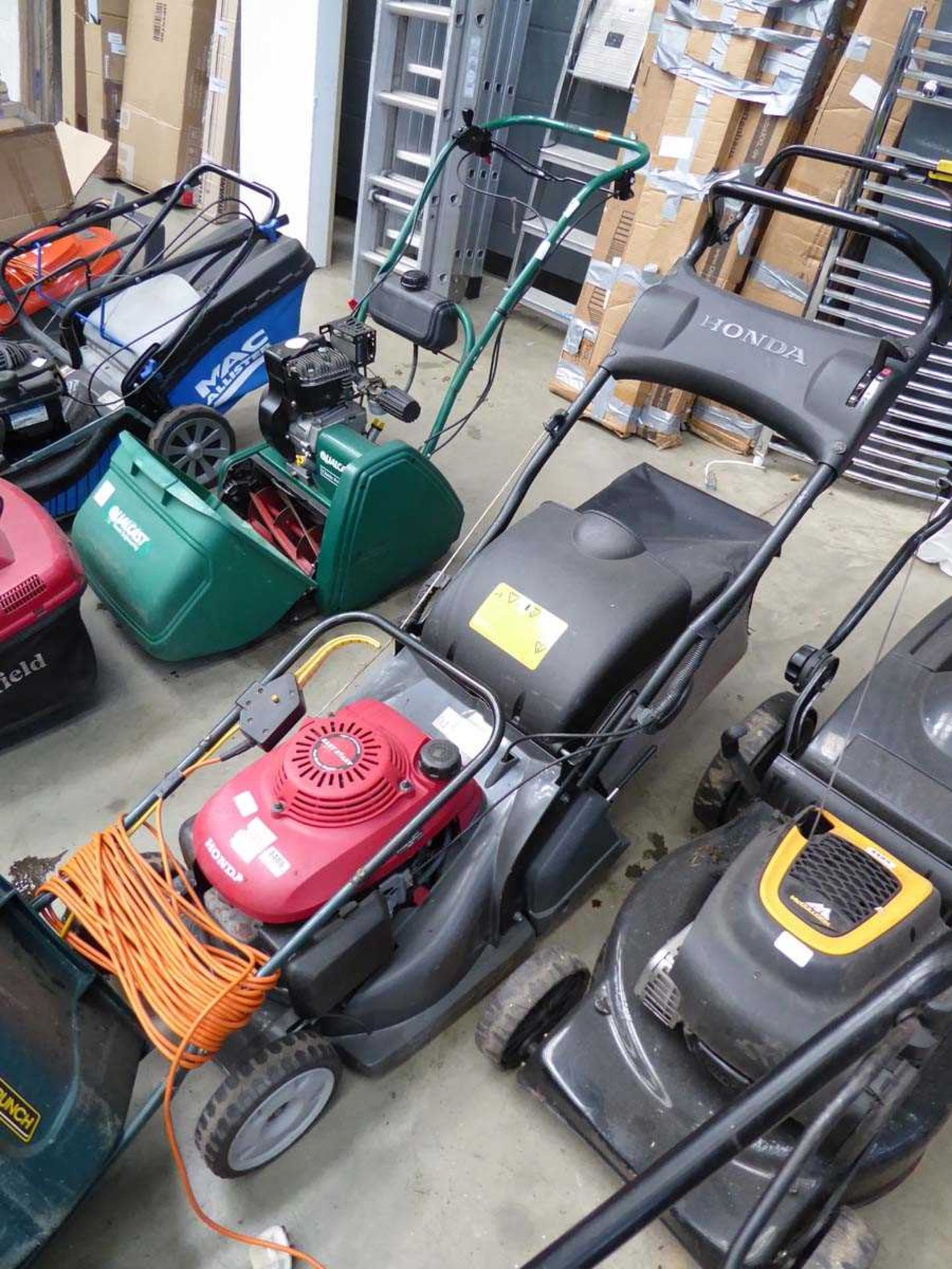 Honda petrol powered rotary mower with grass box