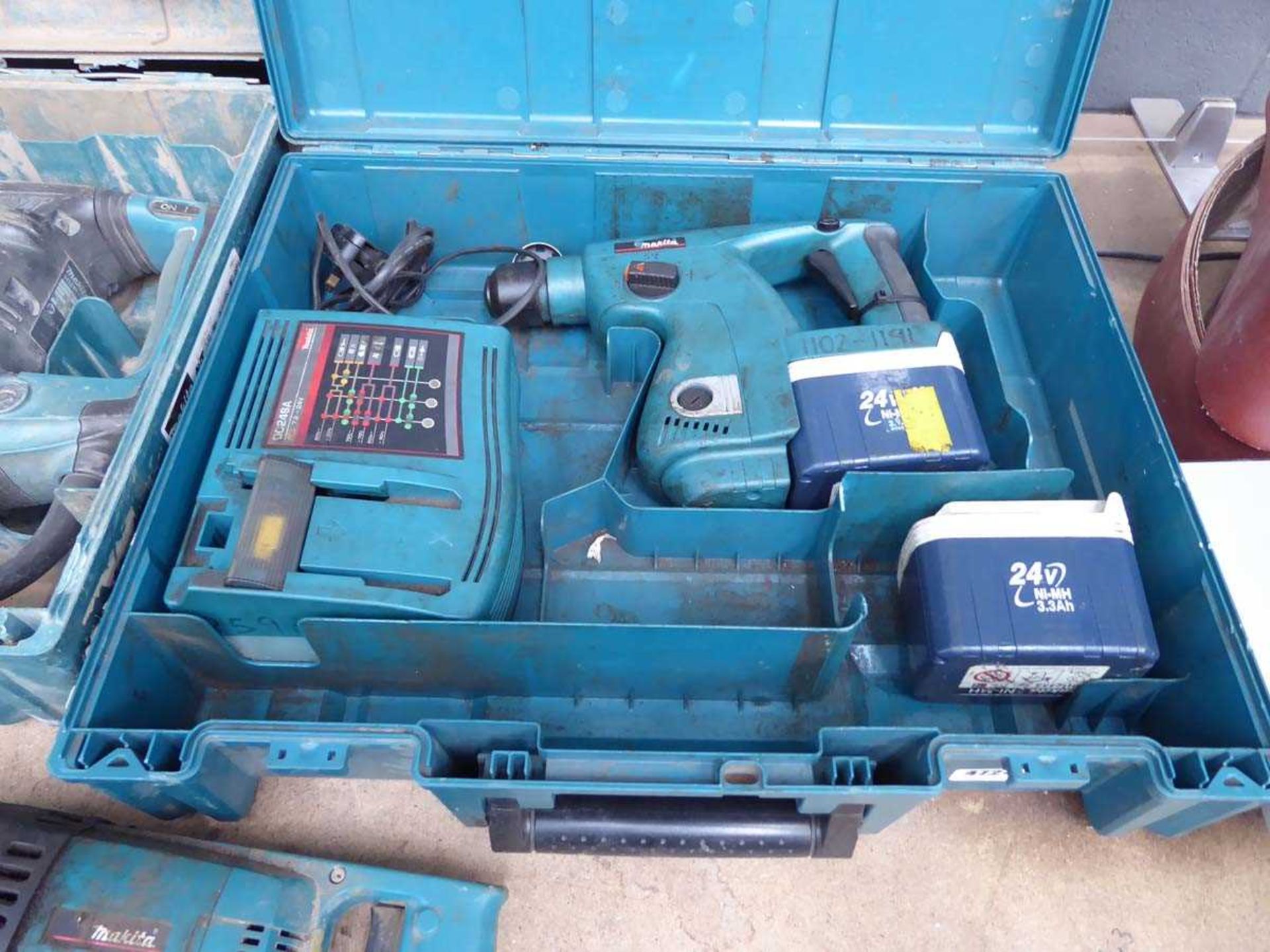 Makita 24V battery drill with 2 batteries and charger