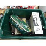 Plastic crate containing cordless edger, planes, etc.