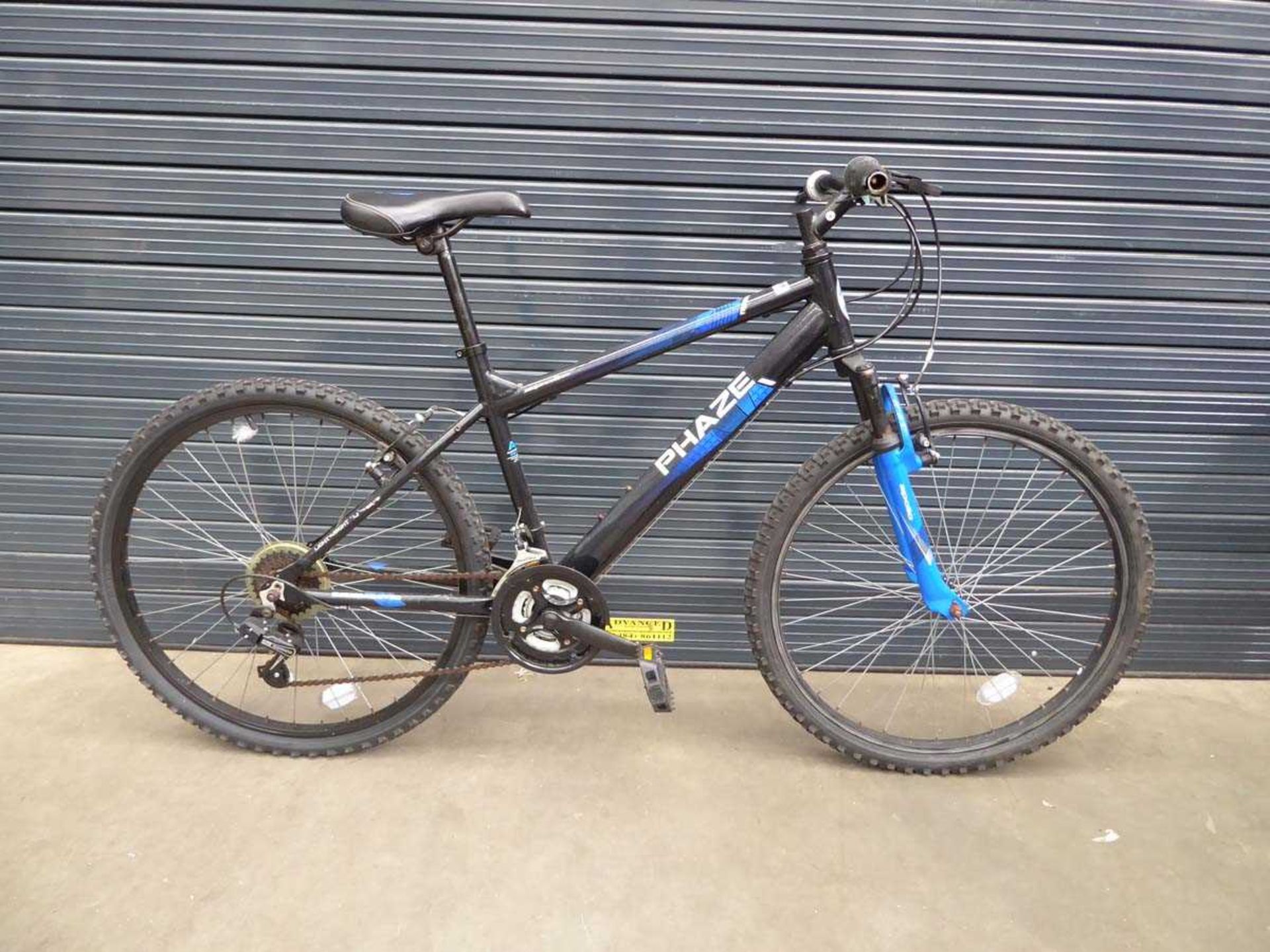 Apollo Phase blue and black junior mountain bike