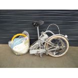 Foldup bike and bag of bike parts