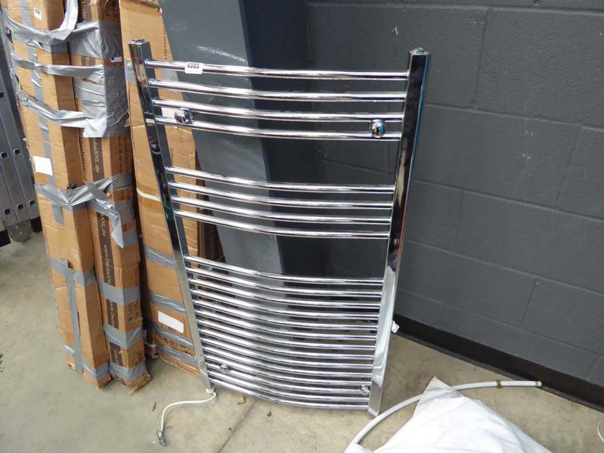 Electric chrome towel radiator and shower valve in sack