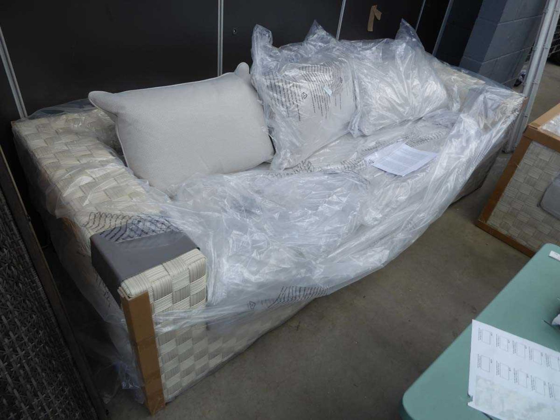 Large cream rattan style garden sofa