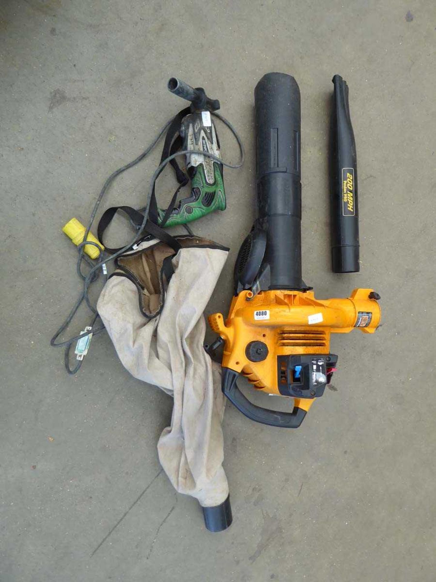 Orange petrol powered leaf blower plus drill