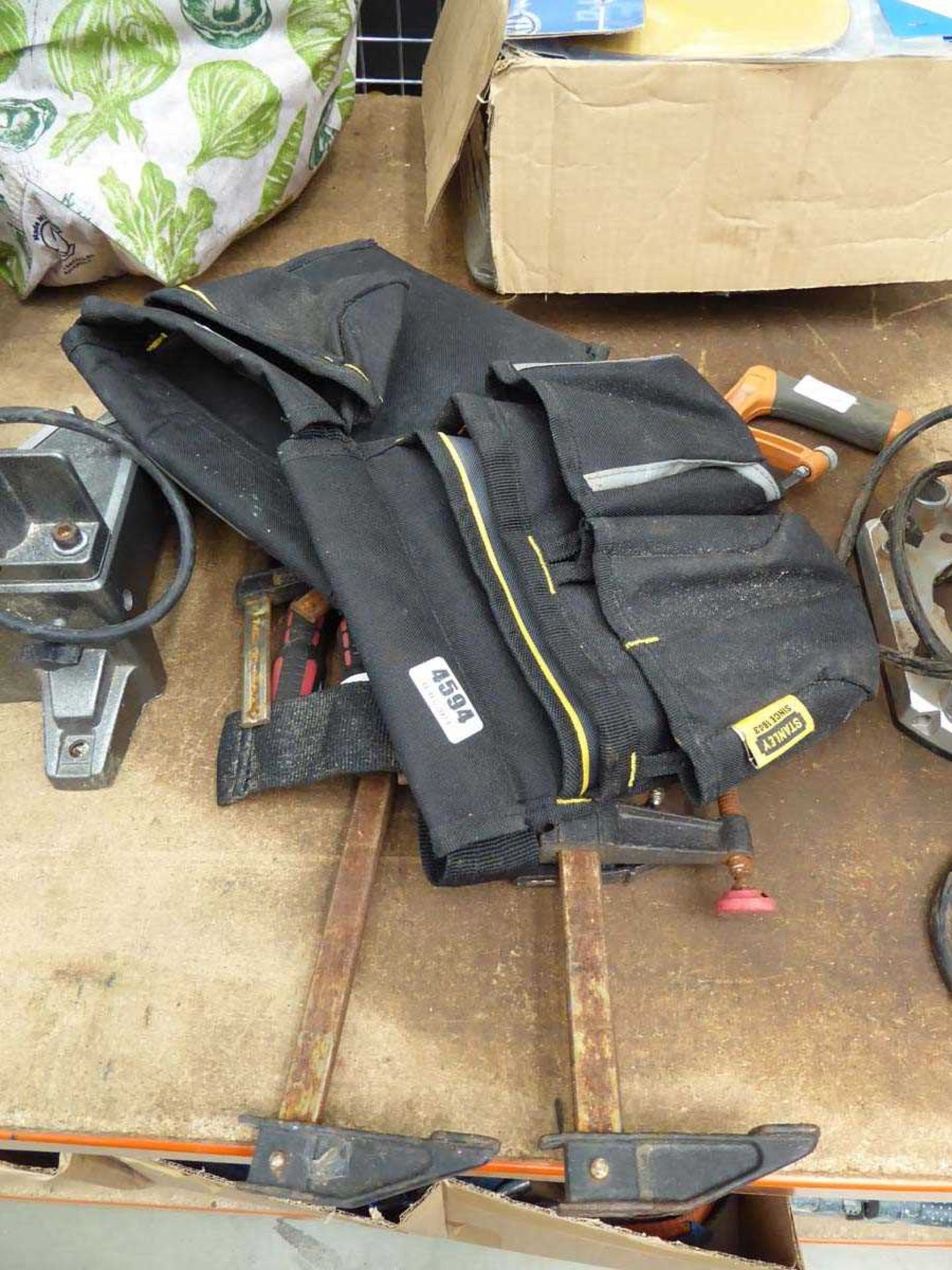 Quantity of clamps and a tool belt