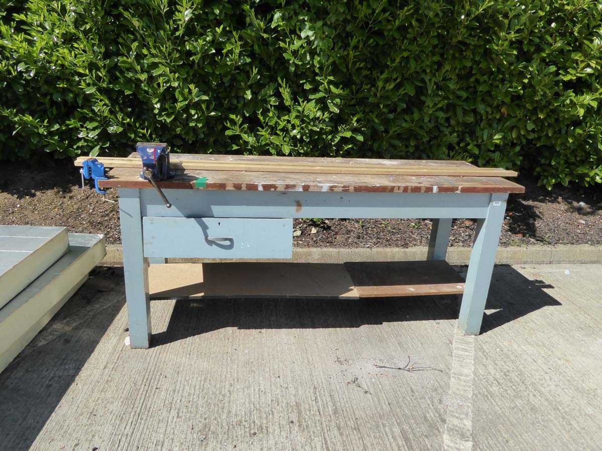 Wooden workbench with two vices and a drawer