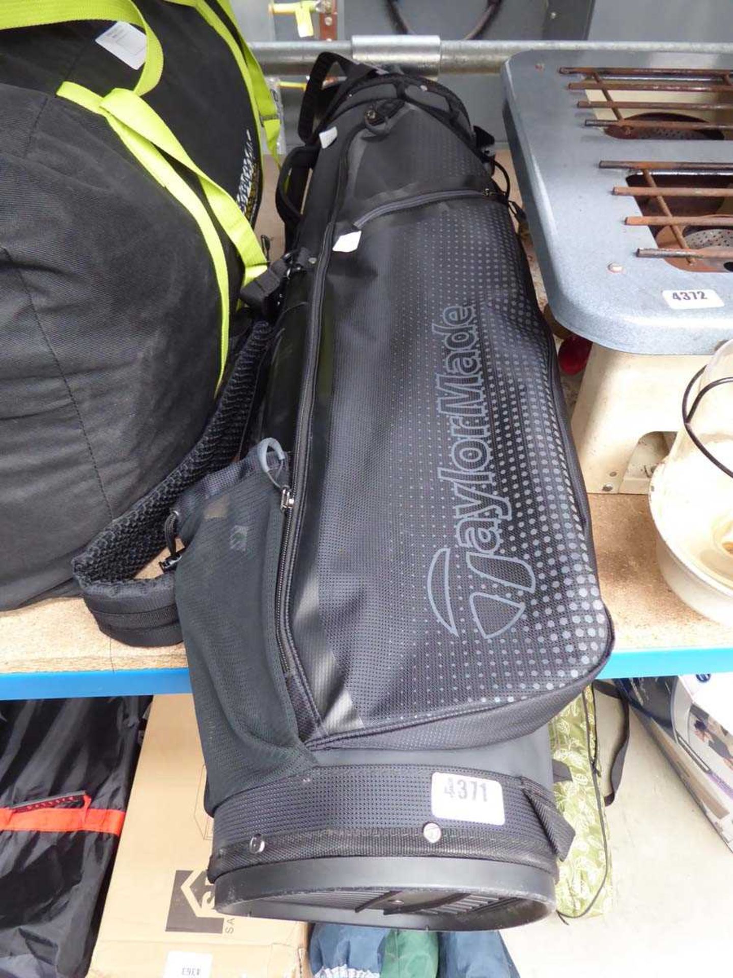 Tailor Made golf bag and quantity of assorted clubs