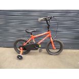 Small red child's Striker bike with stabilisers