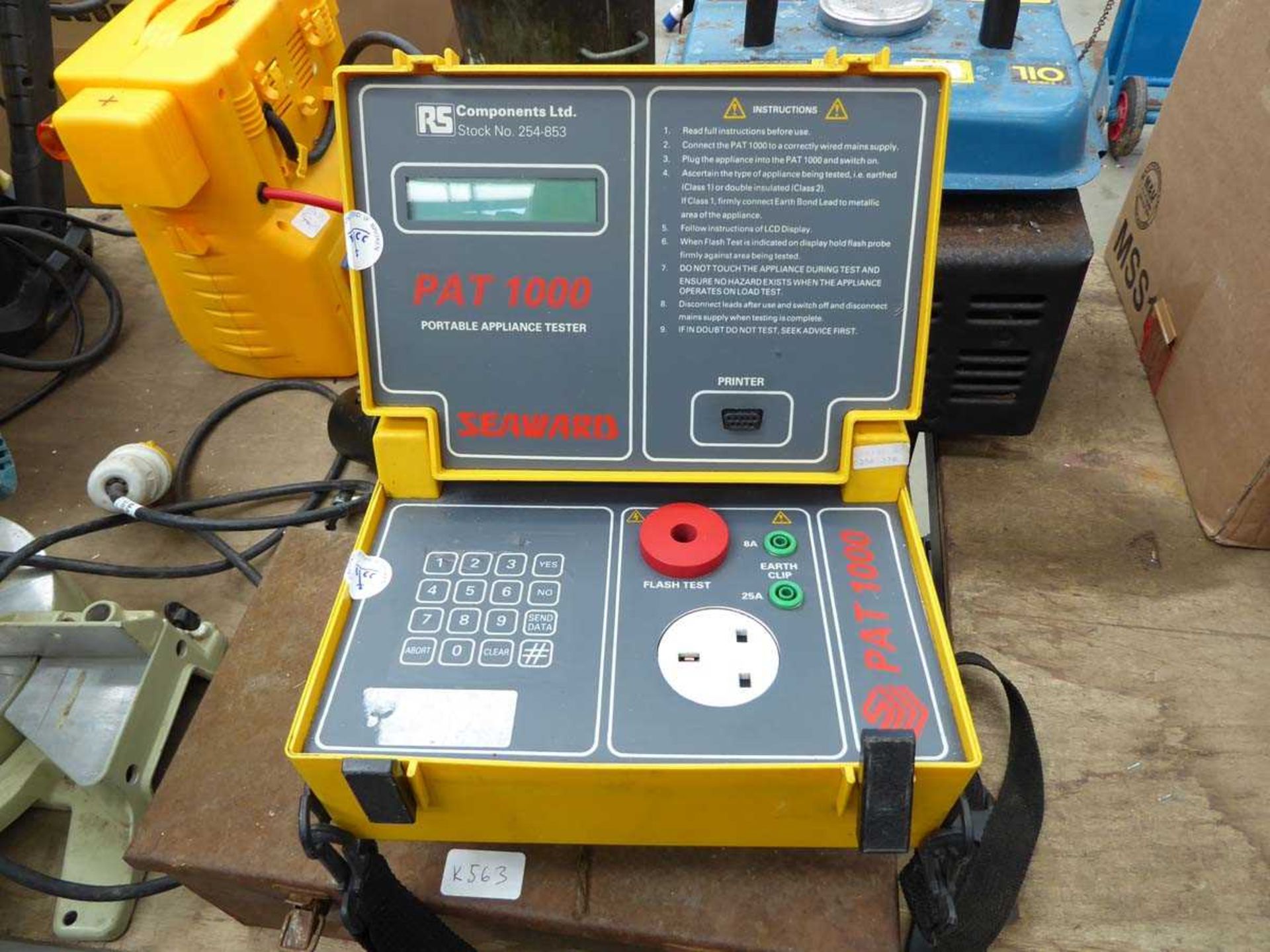Pat testing machine and box containing pipe threader