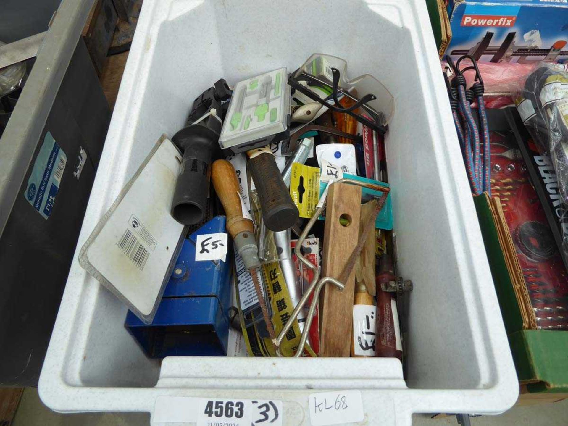 Box containing hammers, safety goggles etc