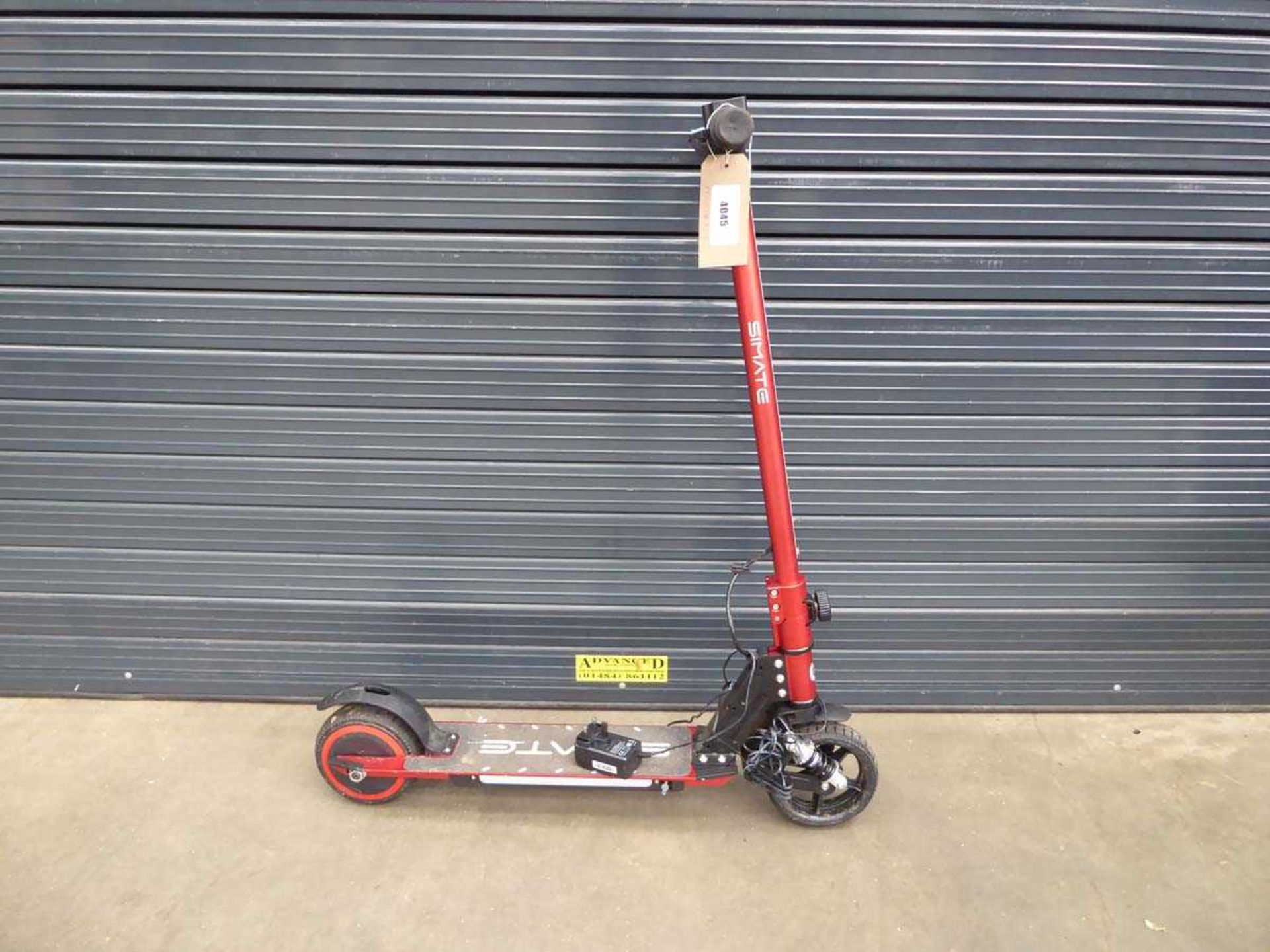 +VAT Small red electric scooter with charger