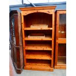 Pine open shelving unit with two stripped pine trays