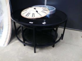 Pair of black glazed circular nesting tables