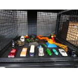 Cage containing Diecast vehicles