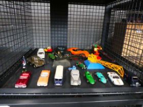 Cage containing Diecast vehicles