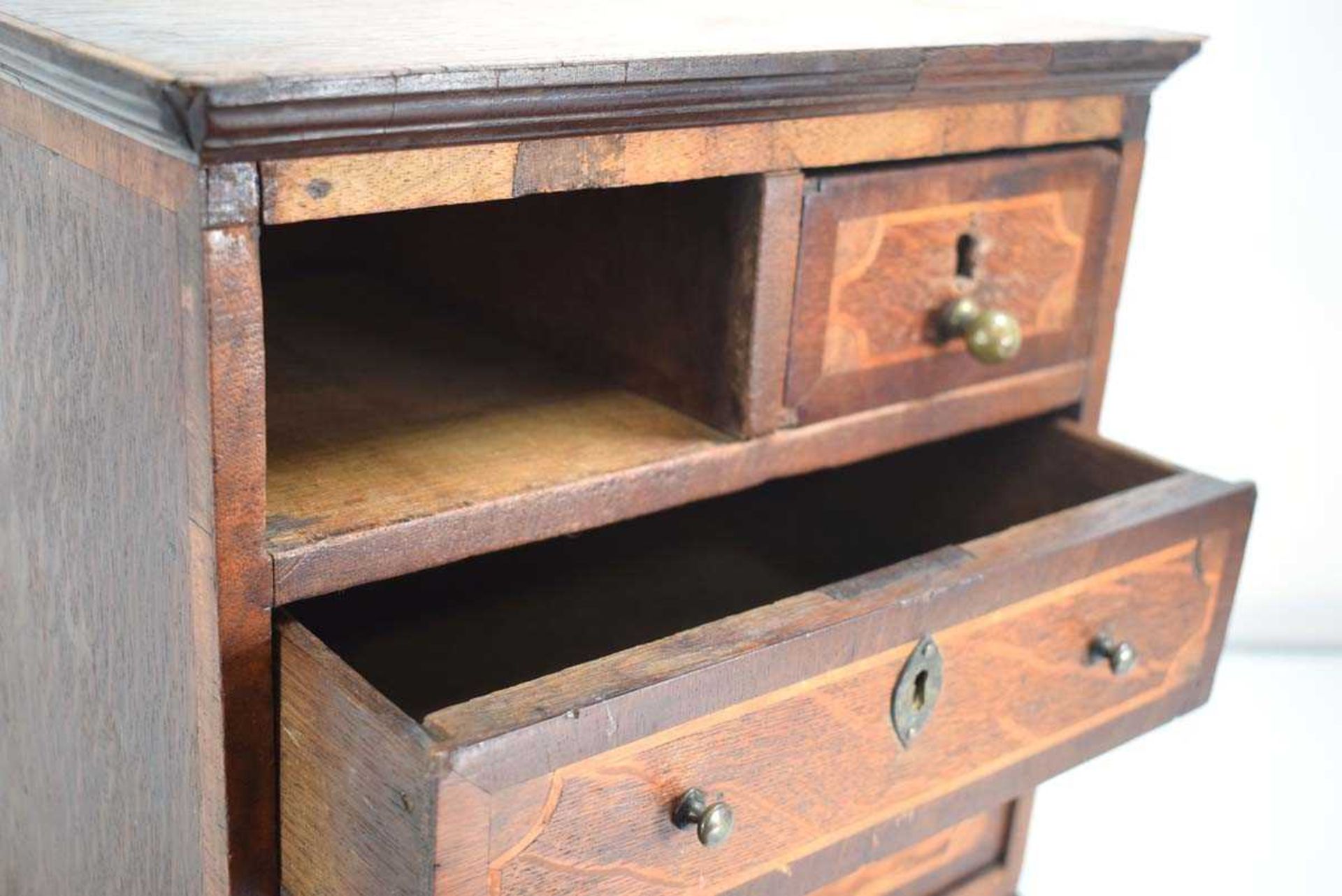 An apprentice chest of two short over three long graduated drawers, the mahogany body with satinwood - Image 8 of 10