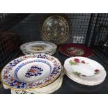 Cage containing assorted decorative plates