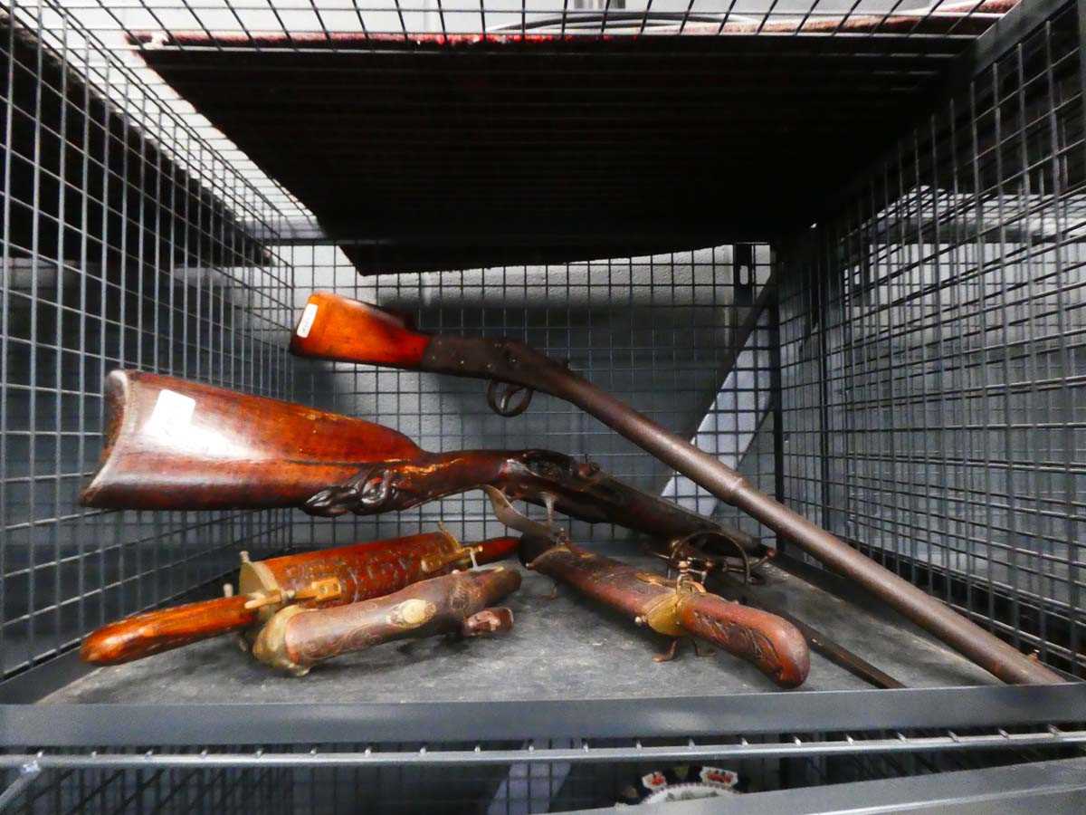Milbro tinplate air rifle, coach gun (missing lock), pistol and three various Eastern knives