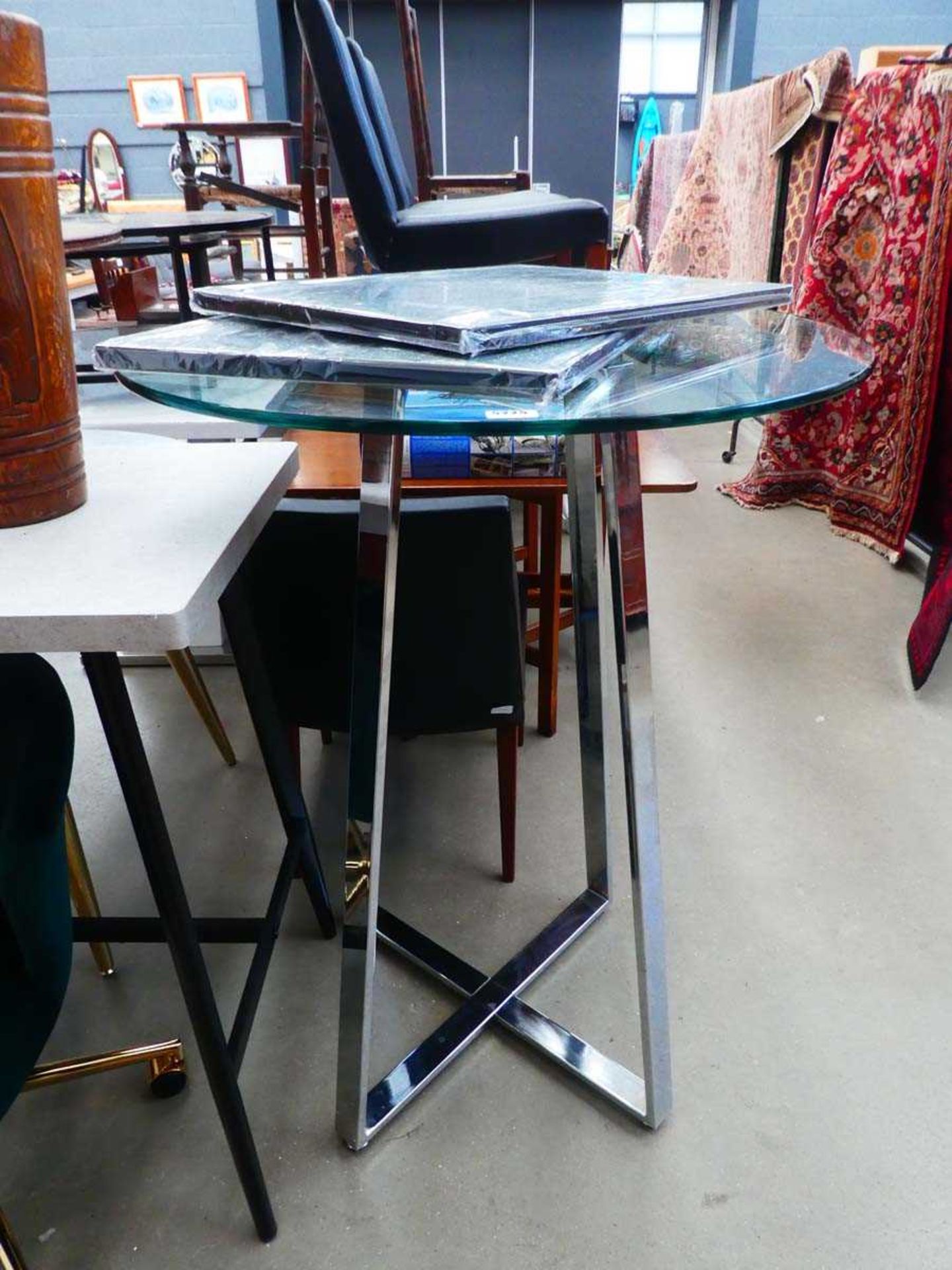 Tall glass bistro table on chrome effect legs