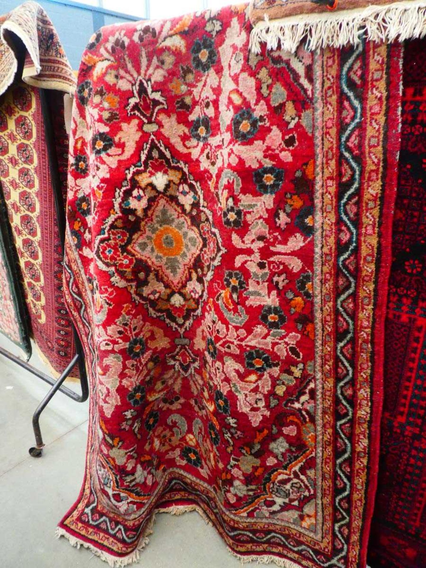 (14) Iranian carpet with red and salmon ground