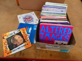 Tray of vinyl singles including Beautiful World, Culture Club, Altered Images etc