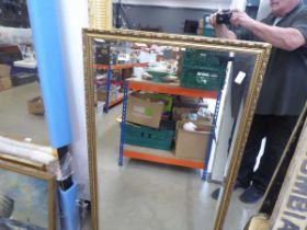 Rectangular bevelled mirror in gilt frame