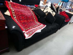 Black 3-seater sofa, together with a matching 2-seater with scatter cushions