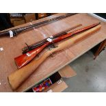 Percussion long gun, steel scabbard, two riding crops and a stock blank