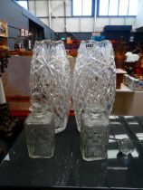 Pair of lead crystal vases, together with a pair of decanters and stoppers One stopper broken